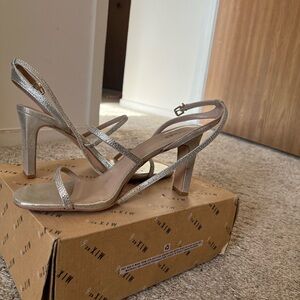 Silver/gold women’s heel Mix No.6 brand. Only worn one time for a wedding.